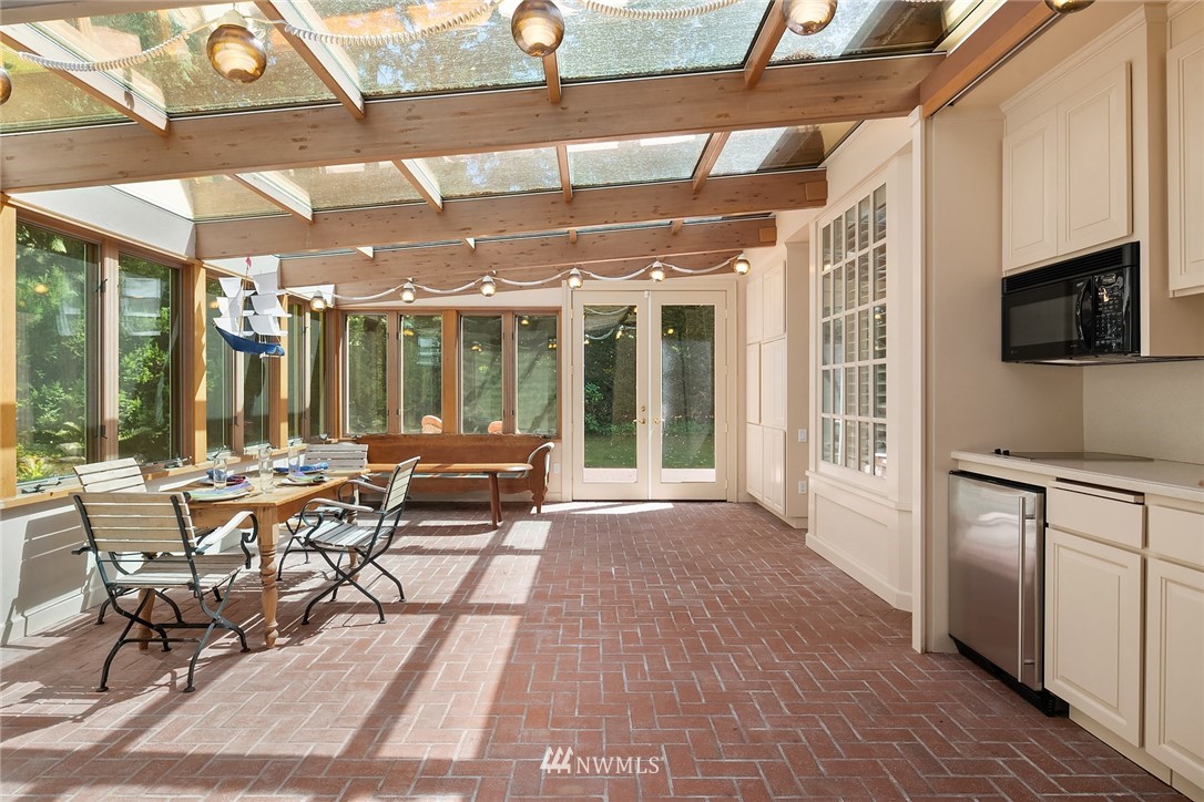 142 Moss Road Shoreline, WA 98177 - Photo 15 of 32 a outdoor space with lots of tables a garden and chairs