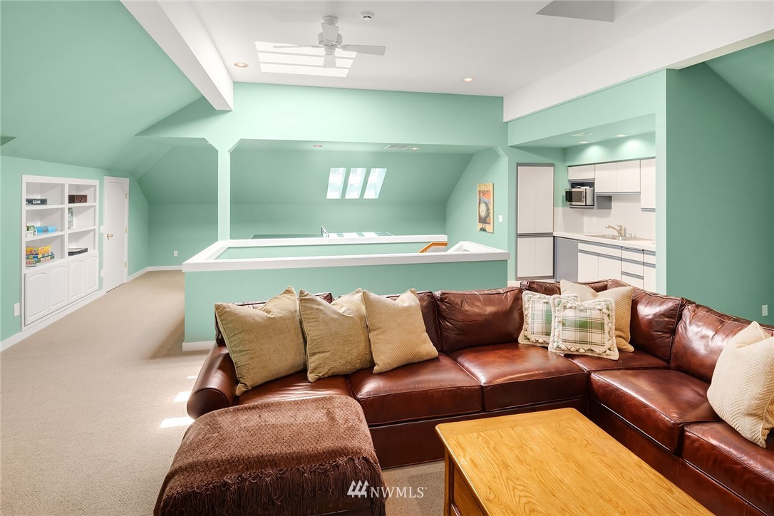 142 Moss Road Shoreline, WA 98177 - Photo 20 of 32 a living room with furniture and a large window