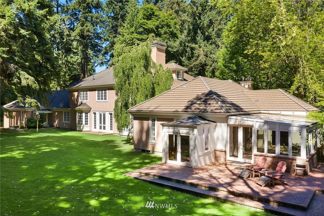 142 Moss Road Shoreline, WA 98177 - Photo 24 of 32 a view of a house with backyard porch and sitting area