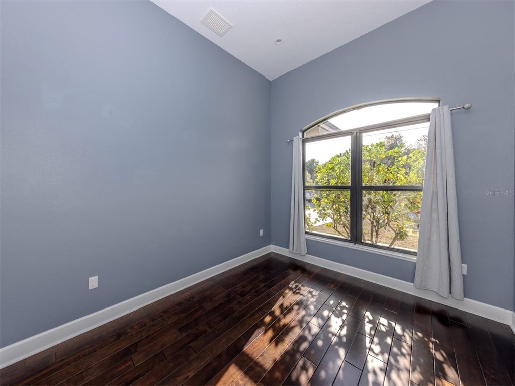 2107 Johannesberg Road North Port, FL 34288 - Photo 13 of 60 a view of an empty room with a window