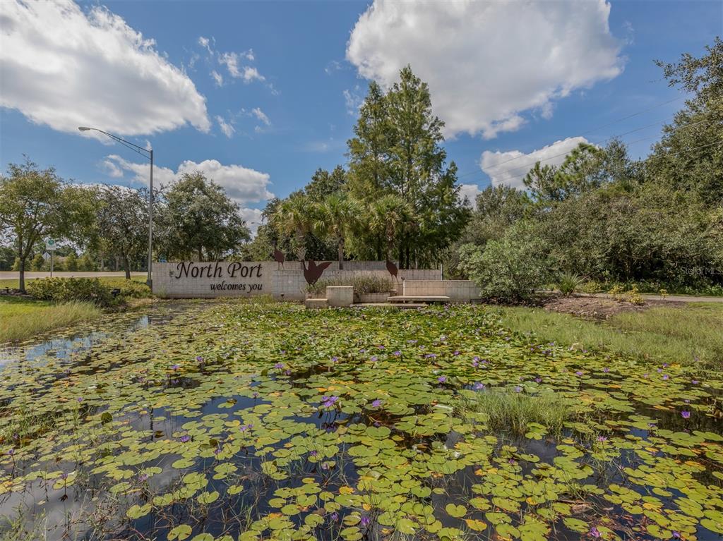 2107 Johannesberg Road North Port, FL 34288 - Photo 50 of 60 a view of outdoor space with garden and trees