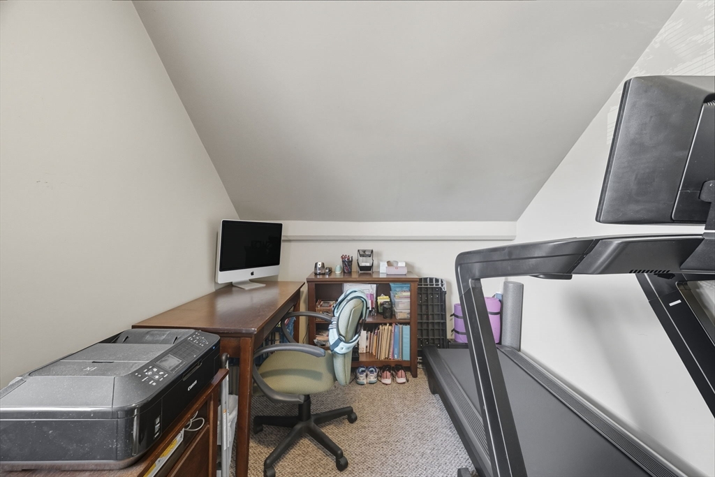 28 R School Street Danvers, MA 01923 - Photo 16 of 31 a view of a workspace with furniture and wooden floor