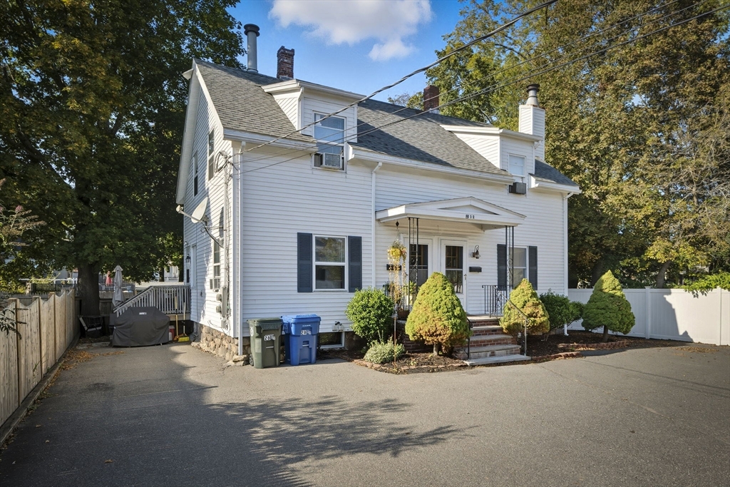 28 R School Street Danvers, MA 01923 - Photo 28 of 31 front view of a house with a patio