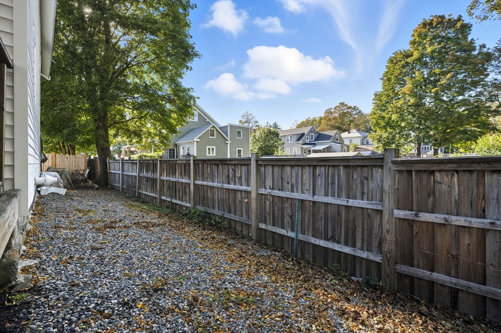 28 R School Street Danvers, MA 01923 - Photo 31 of 31 a view of a backyard with a trees