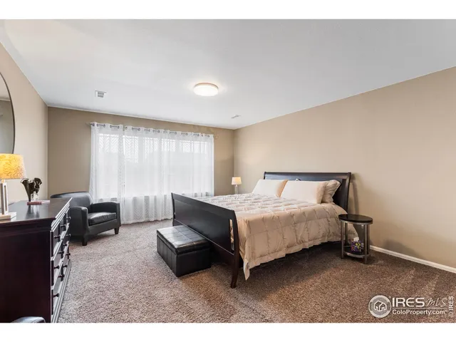 a bathroom with a sink a large mirror and a bathtub