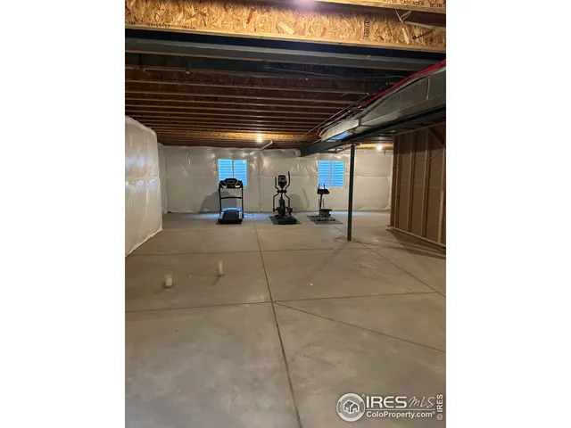 an aerial view of residential building and ocean view