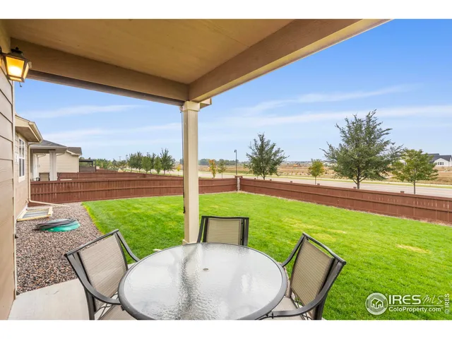 a view of a house with a small yard