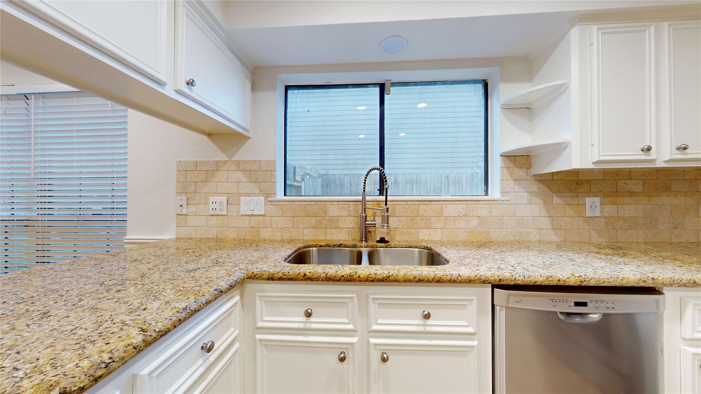 16418 Rainbow Lake Road Houston, TX 77095 - Photo 12 of 47 Spacious kitchen with granite counters, ample workspace, and a large breakfast bar for casual dining.