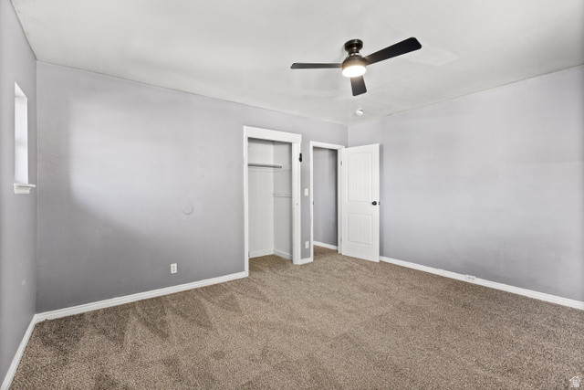 2576 Gramercy Avenue Ogden, UT 84401 - Photo 10 of 20 Unfurnished bedroom with carpet floors, a closet, and a ceiling fan