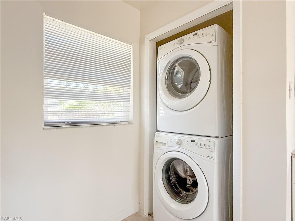 593 92nd Avenue North, Unit A & B Naples, FL 34108 - Photo 6 of 6 a utility room with dryer and washer