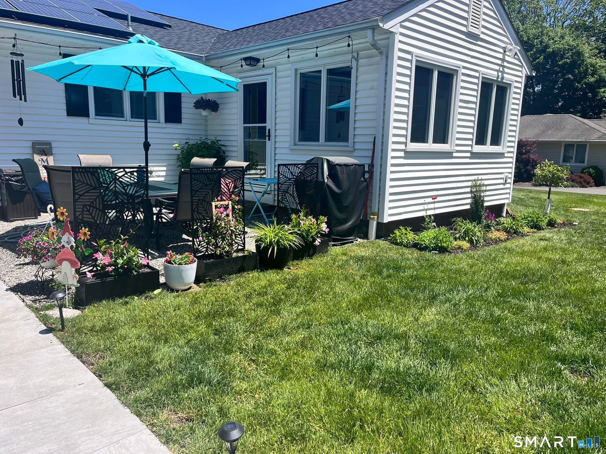 144 Ripton Road Shelton, CT 06484 - Photo 30 of 40 a view of a house with yard and sitting area