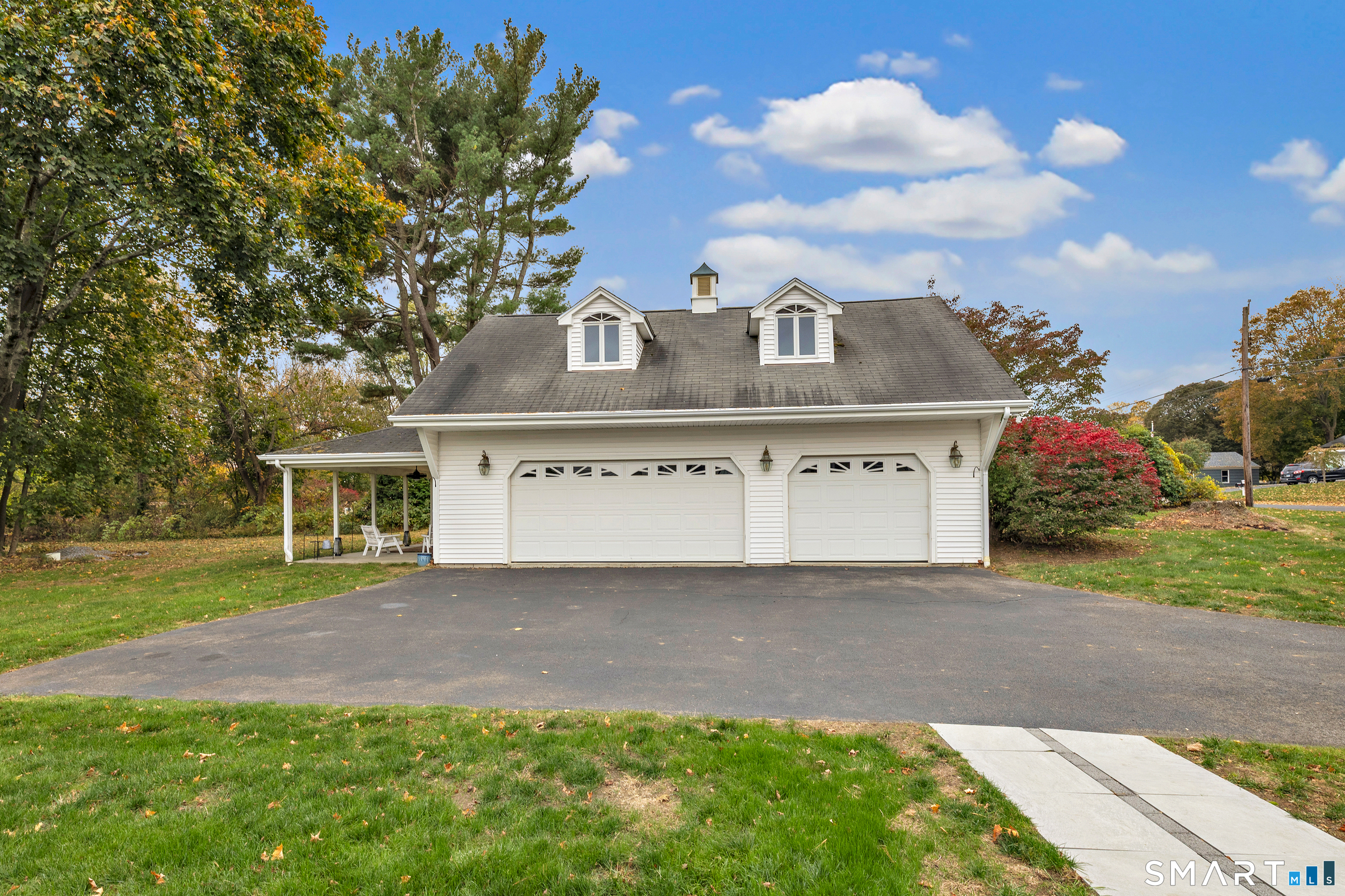 144 Ripton Road Shelton, CT 06484 - Photo 33 of 40 a front view of a house with a yard and garage