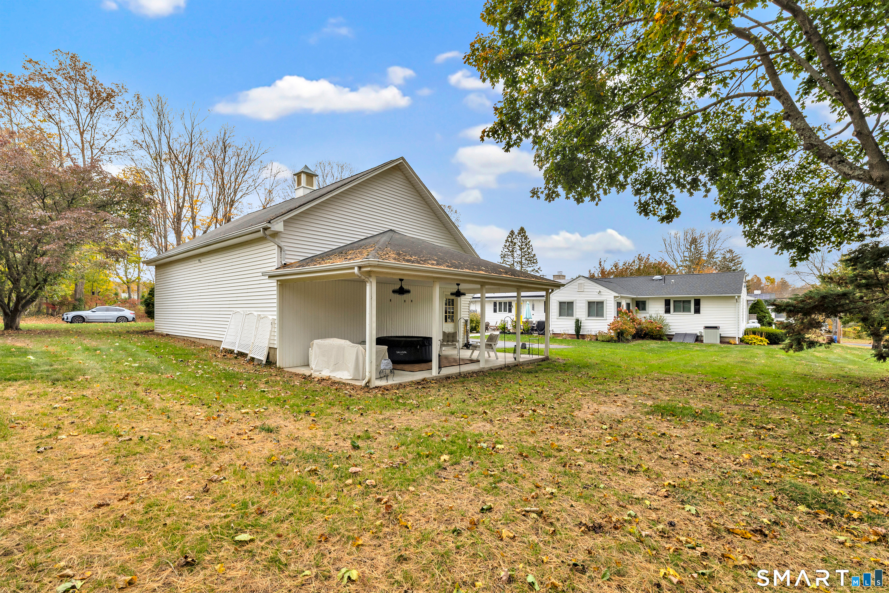 144 Ripton Road Shelton, CT 06484 - Photo 35 of 40 a view of a house with a yard