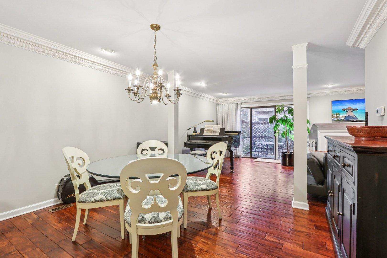 19 Landmark Street, Unit 19 Northfield, IL 60093 - Photo 12 of 50 a view of a dining room with furniture wooden floor and chandelier
