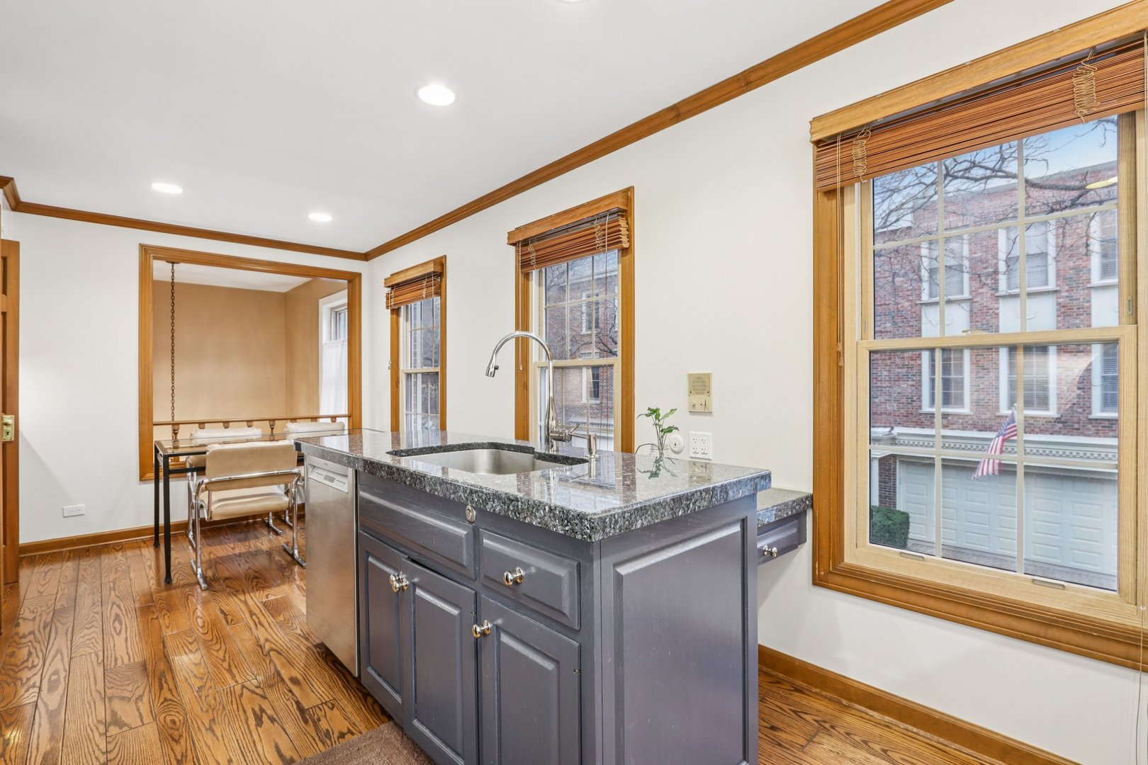 19 Landmark Street, Unit 19 Northfield, IL 60093 - Photo 13 of 50 a dining hall with stainless steel appliances granite countertop a stove and a sink