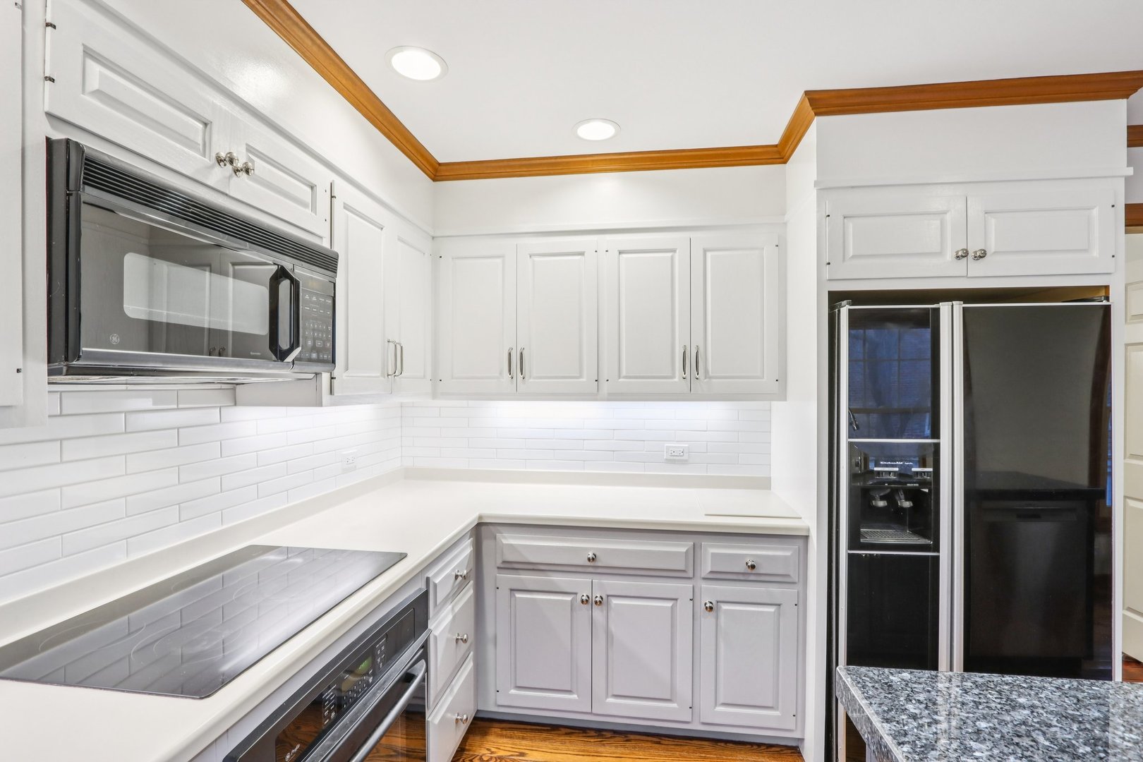 19 Landmark Street, Unit 19 Northfield, IL 60093 - Photo 15 of 50 a kitchen with a sink stove and refrigerator