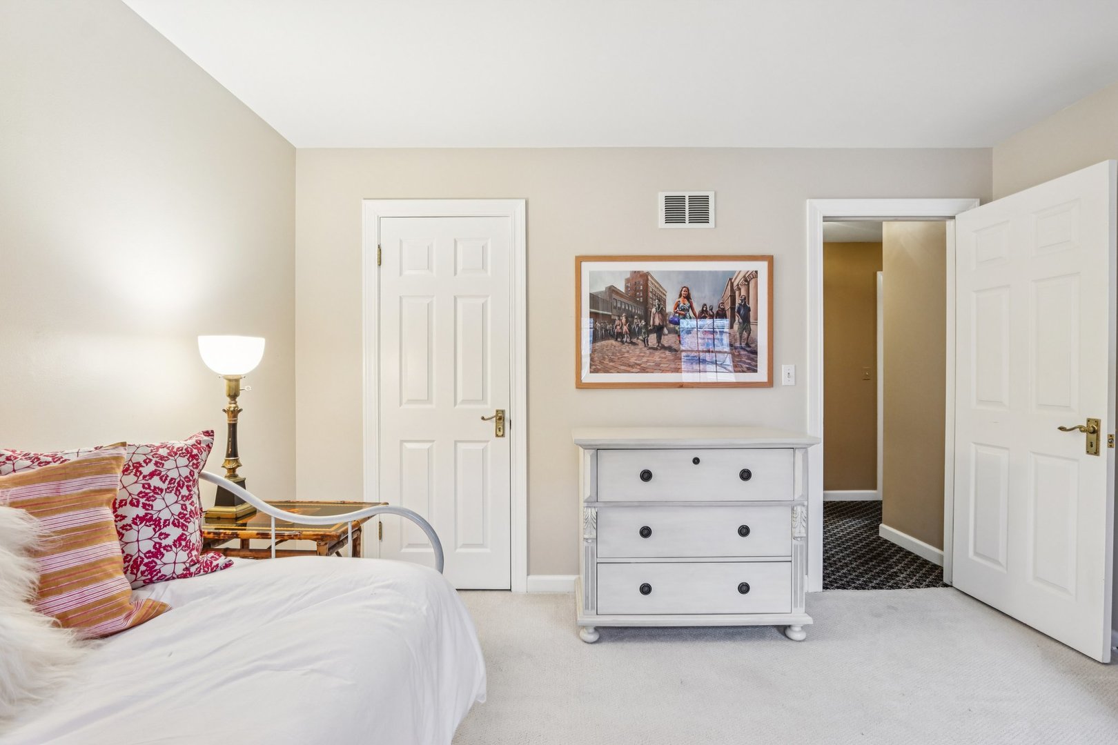 19 Landmark Street, Unit 19 Northfield, IL 60093 - Photo 19 of 50 a bedroom with a bed and a dresser