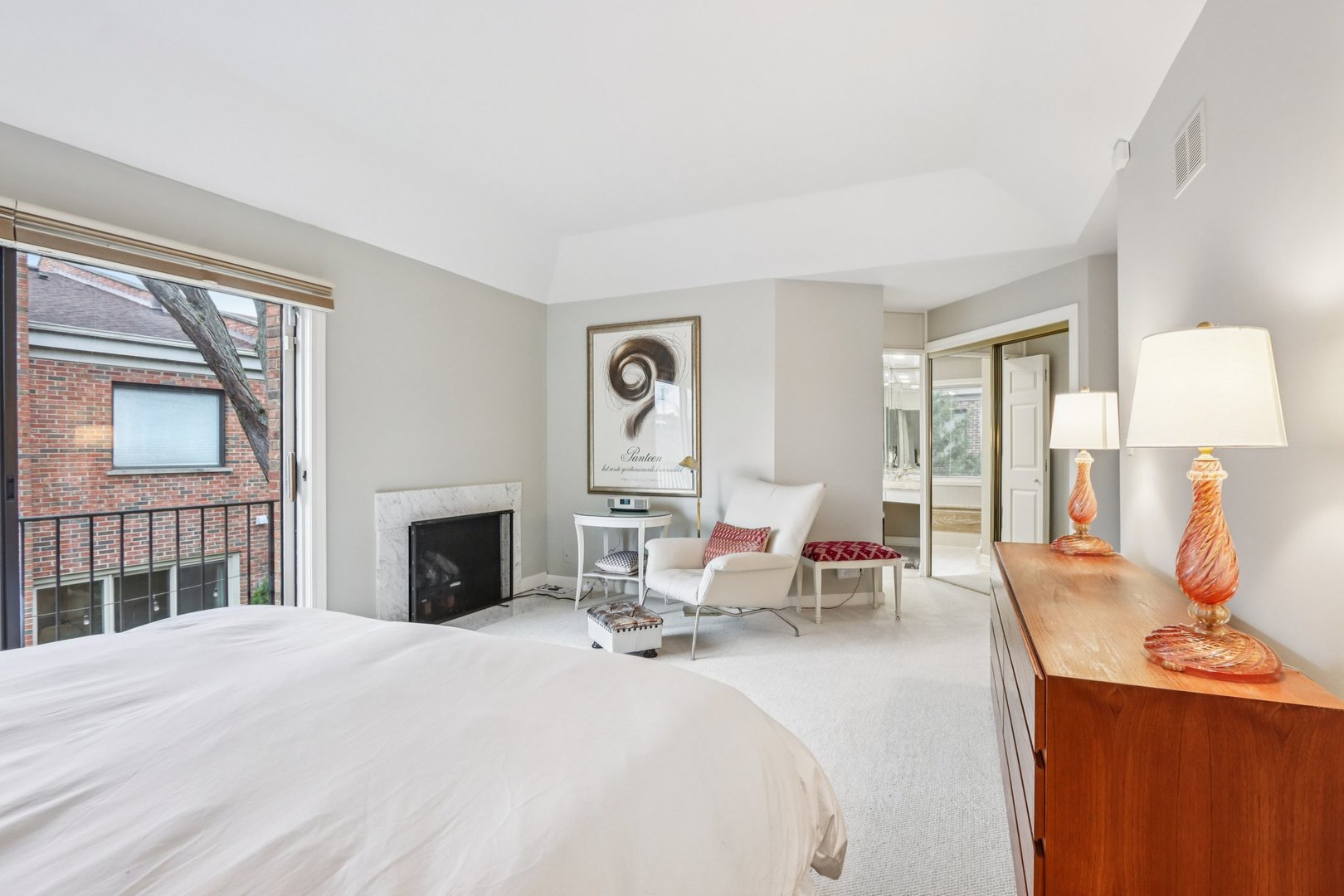 19 Landmark Street, Unit 19 Northfield, IL 60093 - Photo 25 of 50 a bedroom with furniture large window and a fireplace