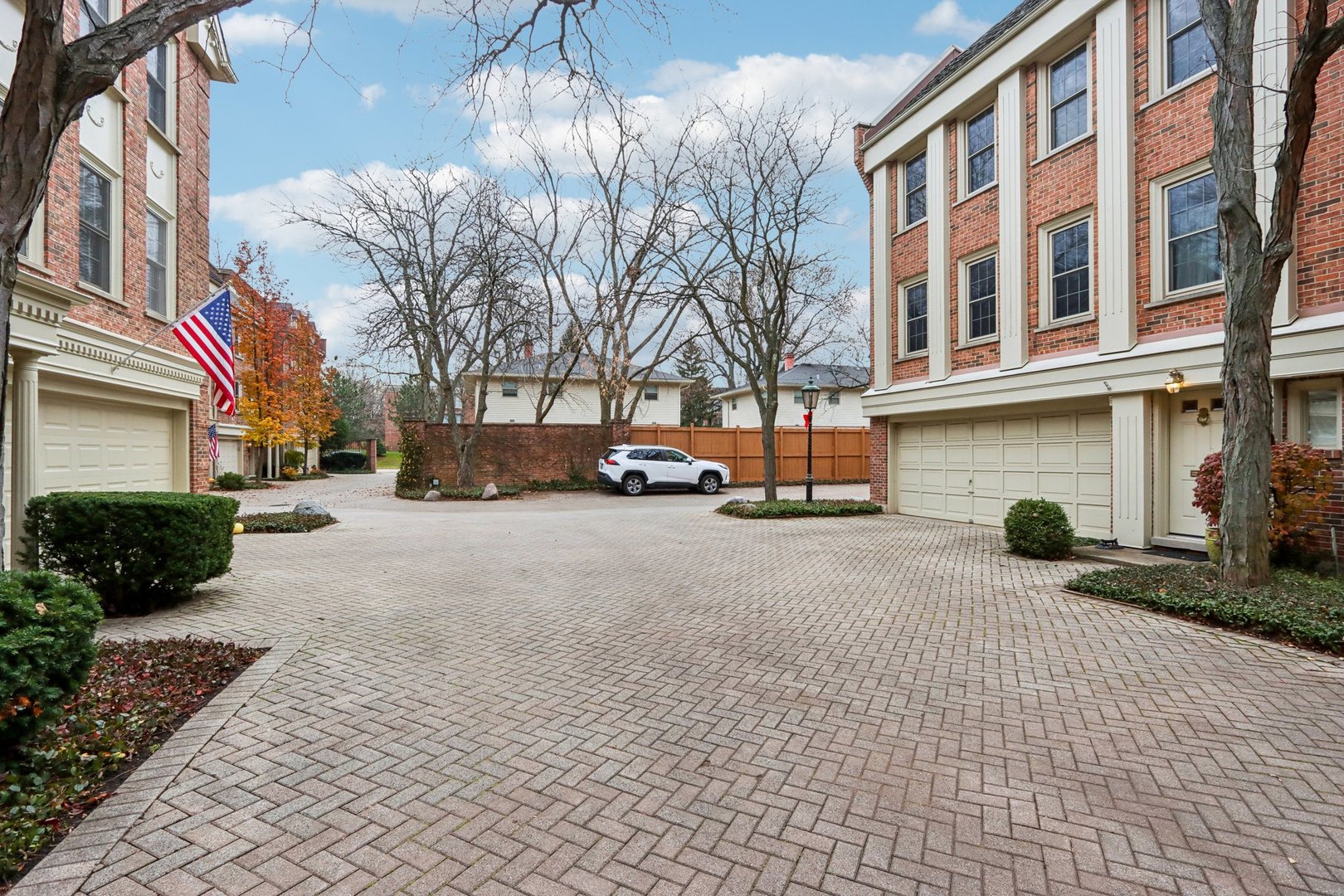 19 Landmark Street, Unit 19 Northfield, IL 60093 - Photo 3 of 50 a view of a building with a yard