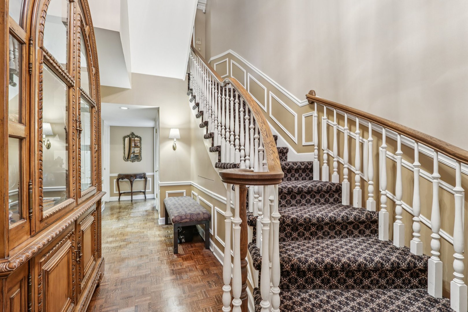 19 Landmark Street, Unit 19 Northfield, IL 60093 - Photo 7 of 50 a view of an entryway with wooden floor and a front door