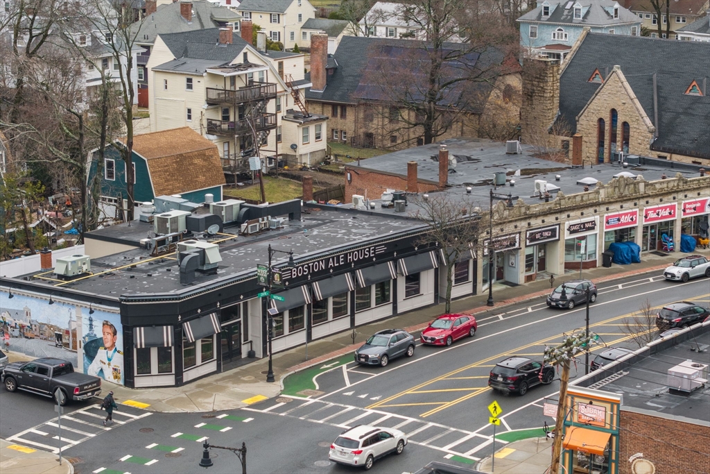 5 Baker Street Boston, MA 02132 - Photo 38 of 40 a city street filled with traffic