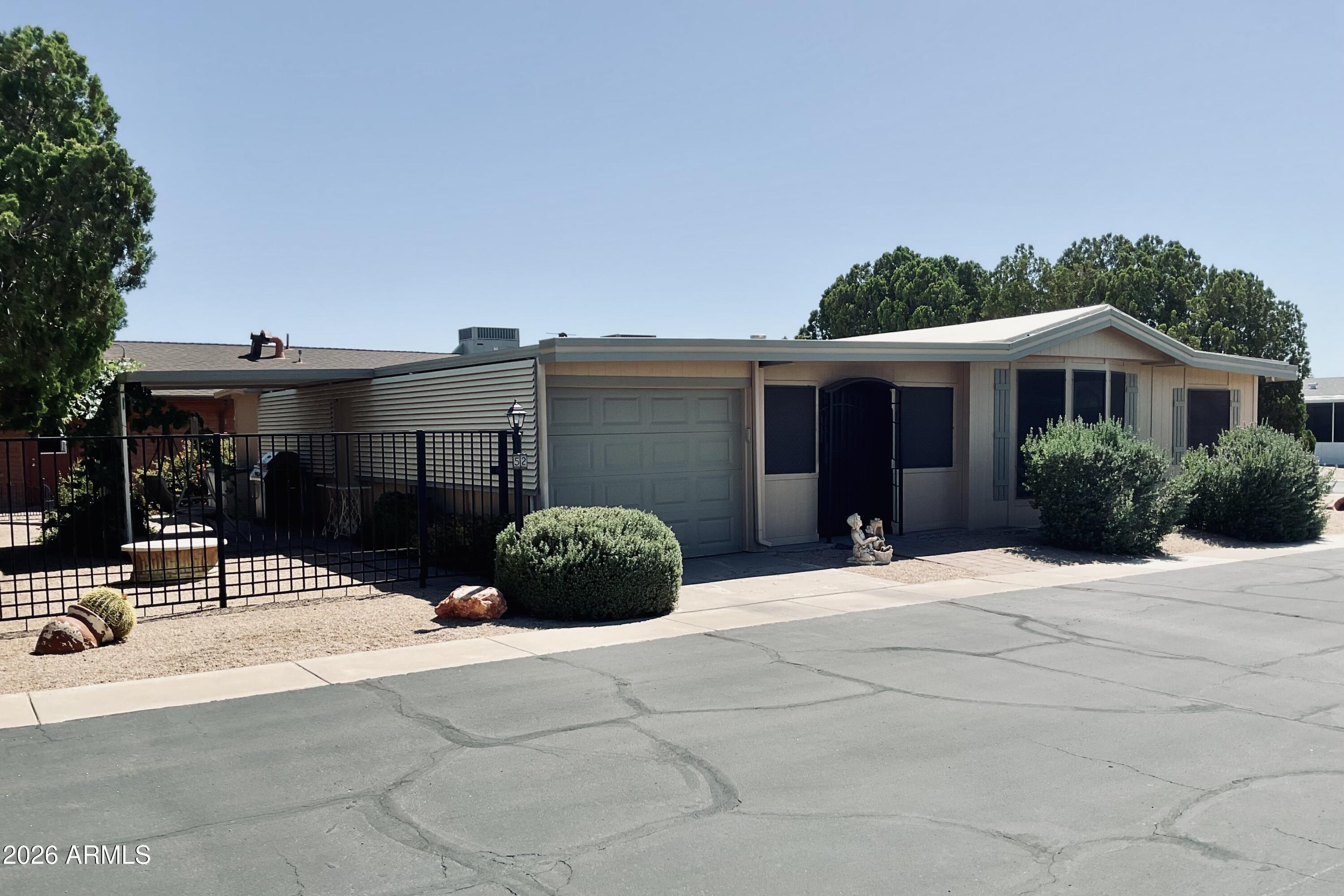 3036 East Utopia Road, Unit 52 Phoenix, AZ 85050 - Photo 3 of 36 Front with East View