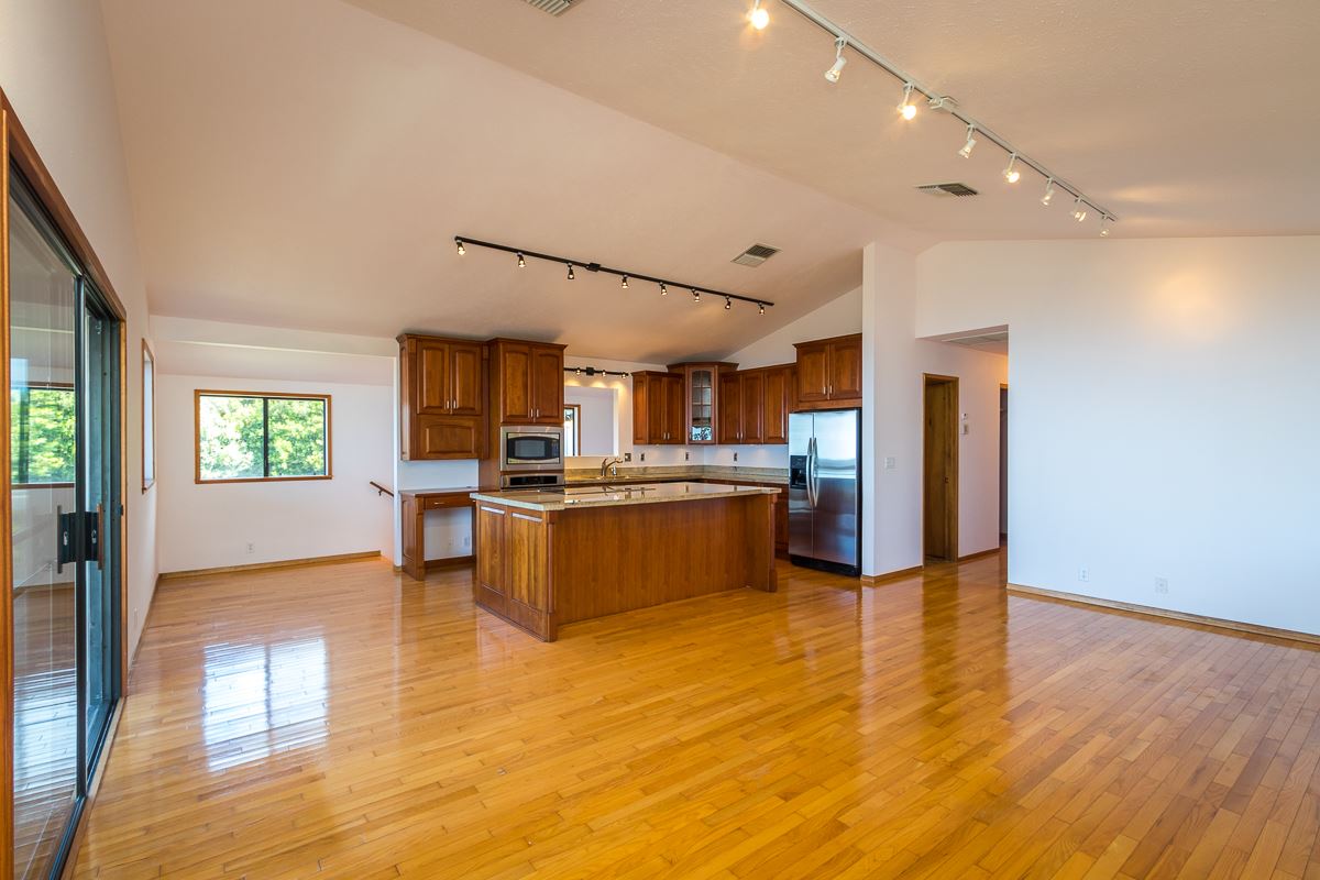 395 Middle Road Kula, HI 96790 - Photo 16 of 30 a view of kitchen with cabinets and wooden floor