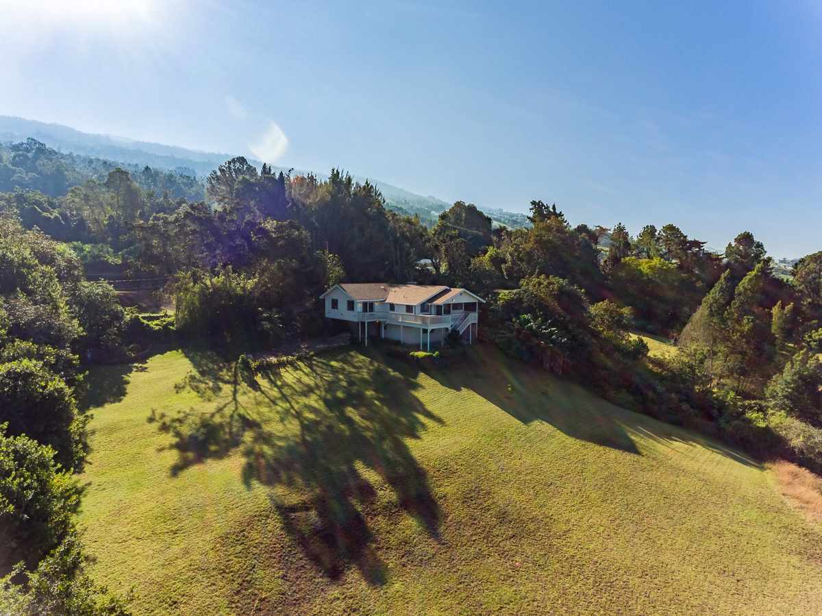395 Middle Road Kula, HI 96790 - Photo 2 of 30 a view of a swimming pool with a yard
