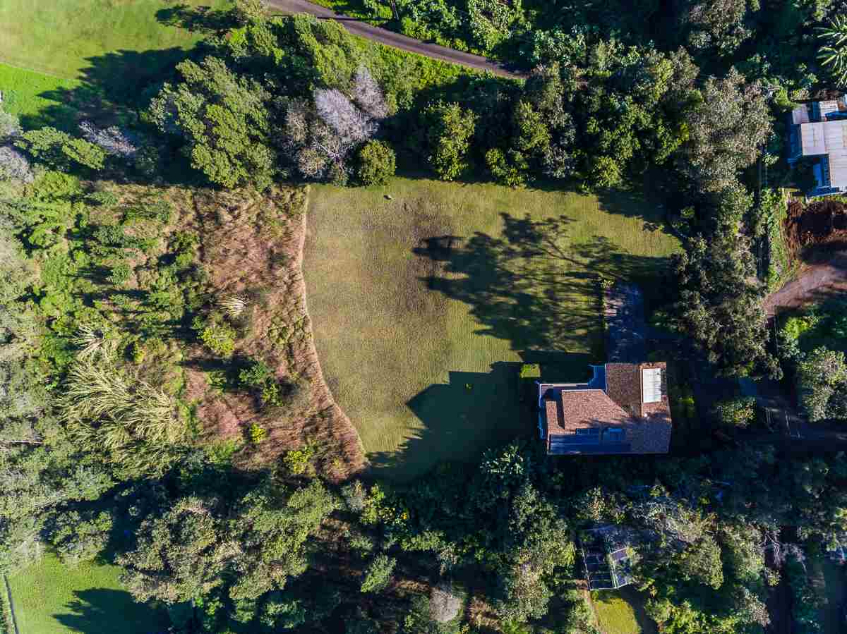 395 Middle Road Kula, HI 96790 - Photo 10 of 30 an aerial view of a house with a yard