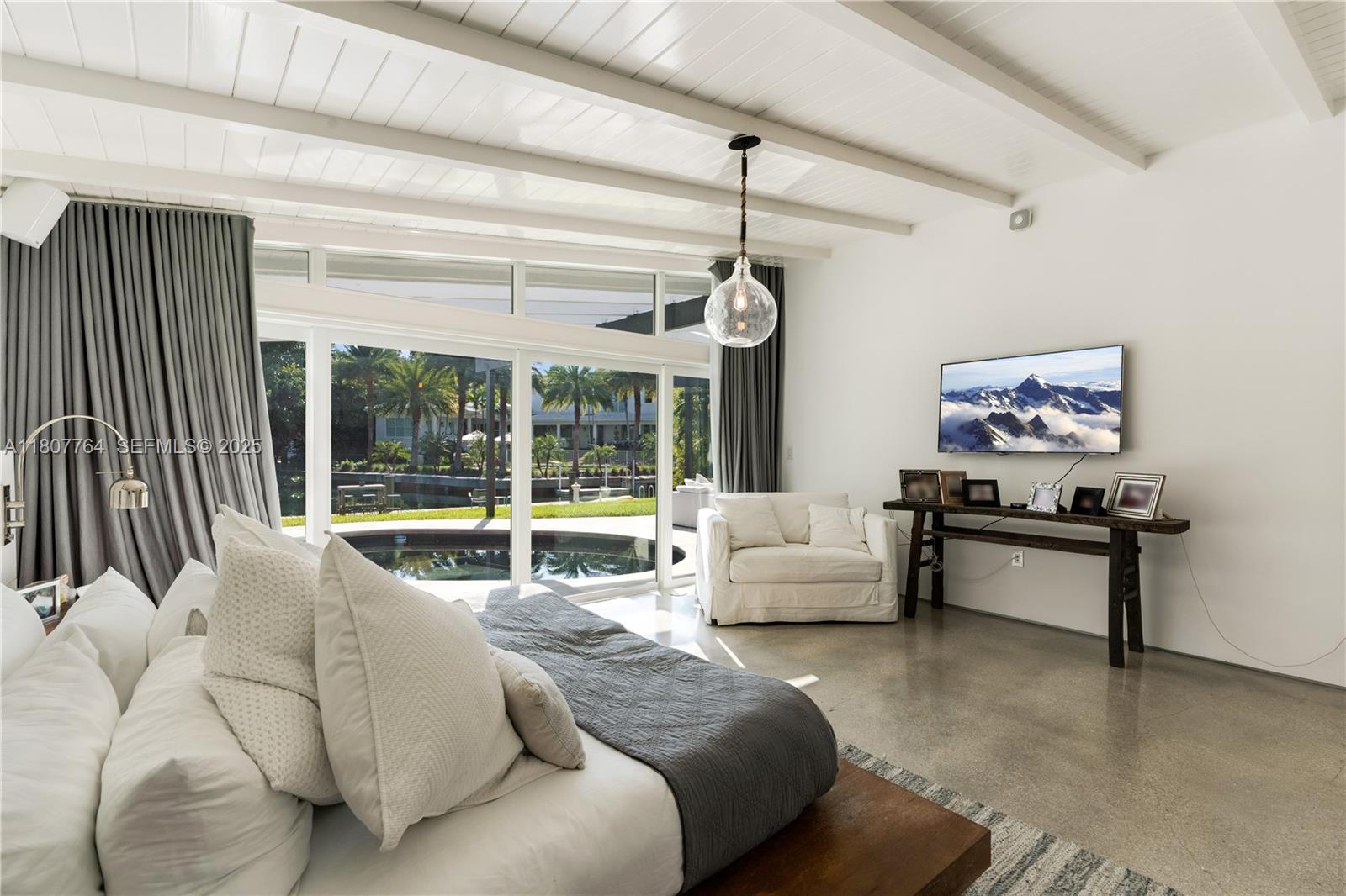 270 Island Drive Key Biscayne, FL 33149 - Photo 13 of 19 a living room with furniture and a large window