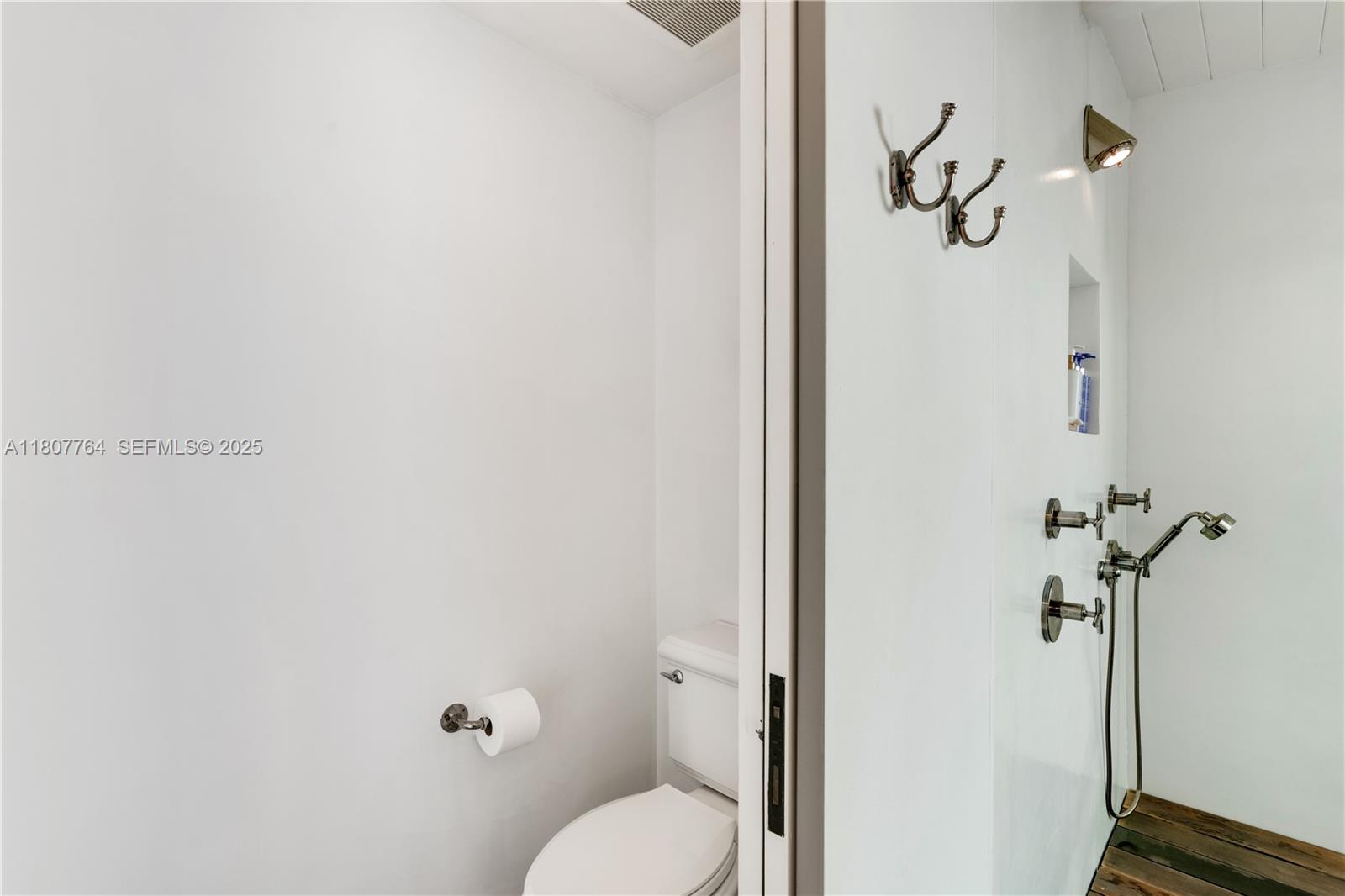 270 Island Drive Key Biscayne, FL 33149 - Photo 19 of 19 a bathroom with a toilet