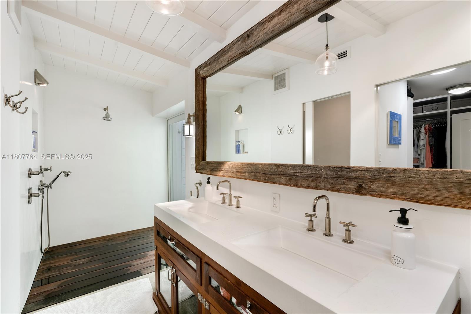 270 Island Drive Key Biscayne, FL 33149 - Photo 8 of 19 a bathroom with a sink and a mirror