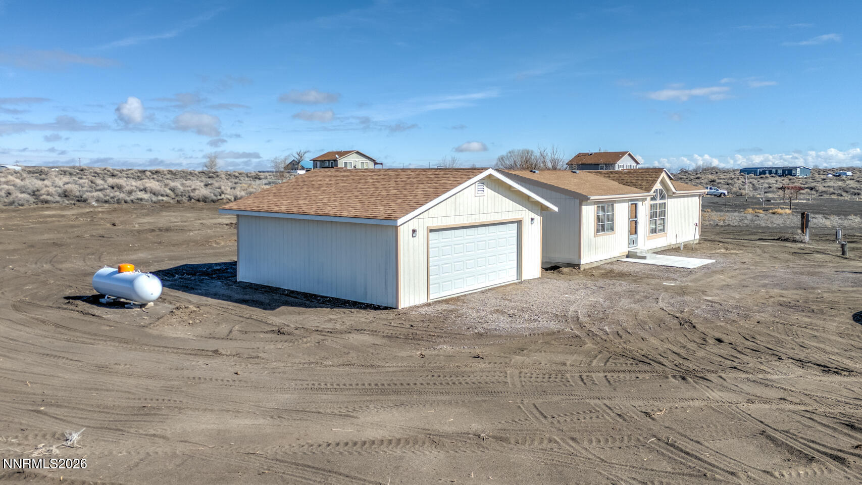 6312 Sierra Way Fallon, NV 89406 - Photo 17 of 20 a view of roof deck with two plants and a building