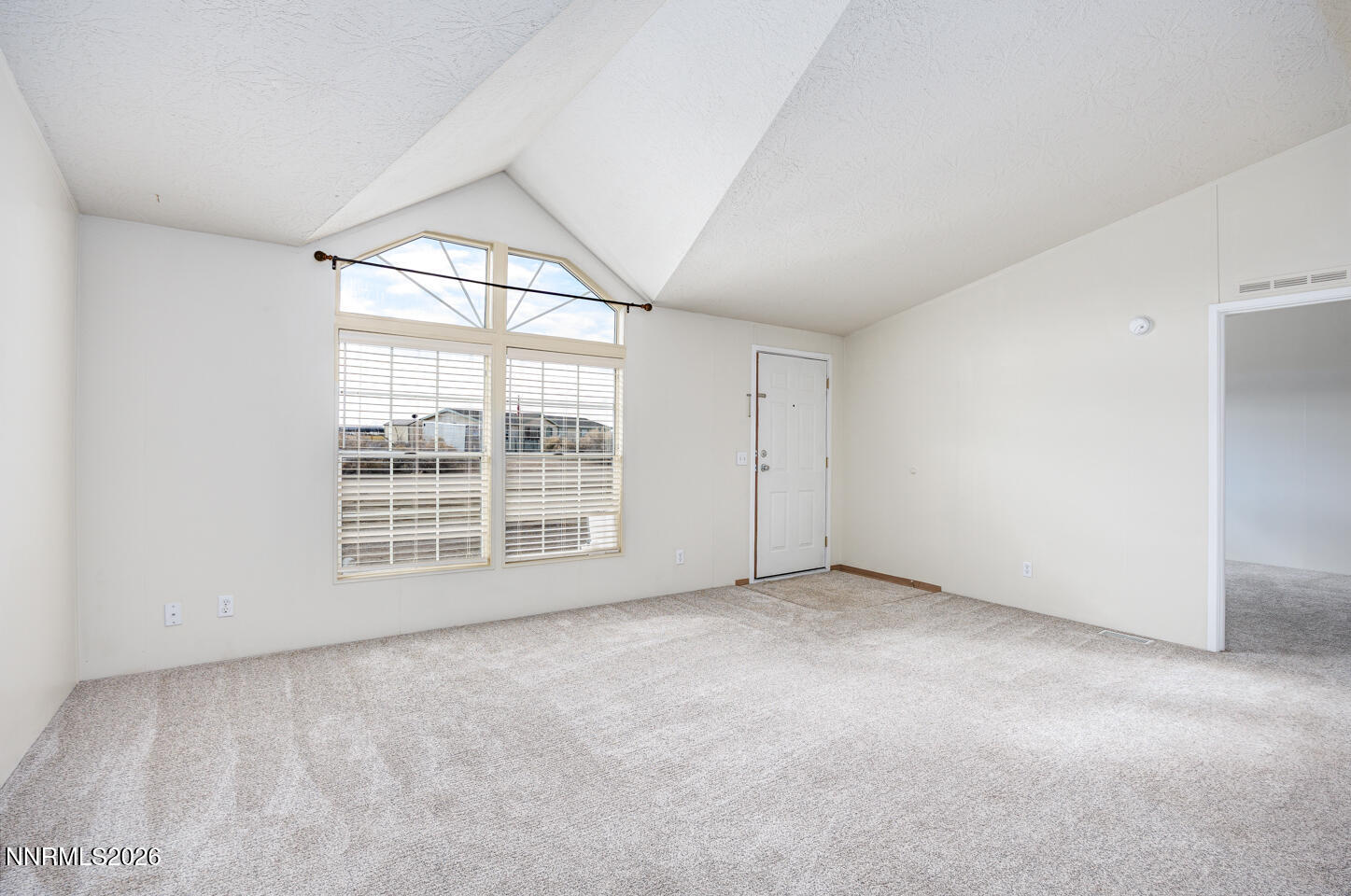 6312 Sierra Way Fallon, NV 89406 - Photo 3 of 20 an empty room with a window
