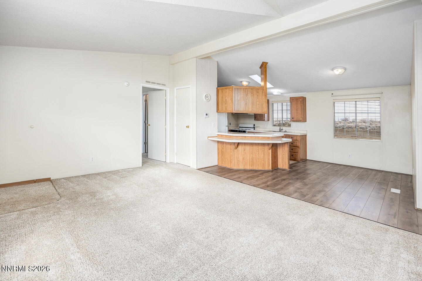 6312 Sierra Way Fallon, NV 89406 - Photo 4 of 20 a view of a kitchen with a sink and a stove top oven