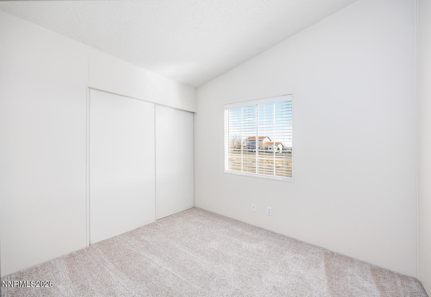 6312 Sierra Way Fallon, NV 89406 - Photo 10 of 20 an empty room with a window