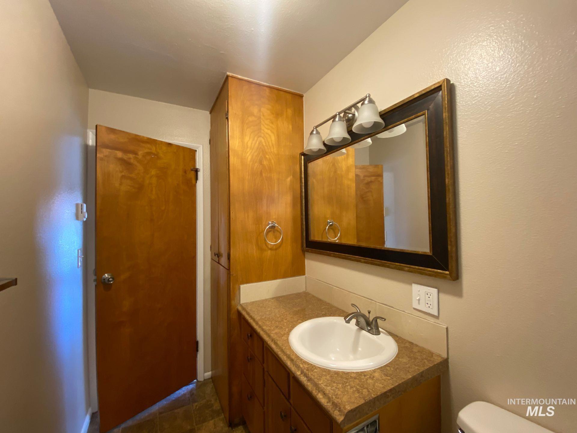 160 Northwest 3rd Street Ontario, OR 97914 - Photo 3 of 4 Half bath featuring vanity