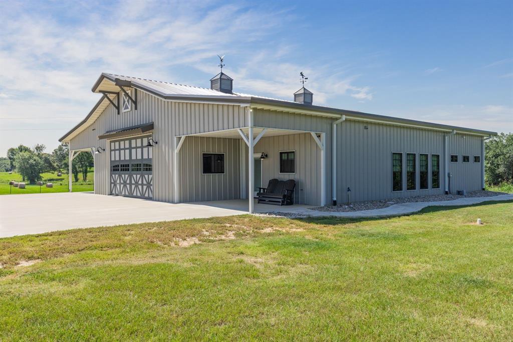 2072 East US 69 Emory, TX 75440 - Photo 3 of 39 a view of a house with a yard and porch