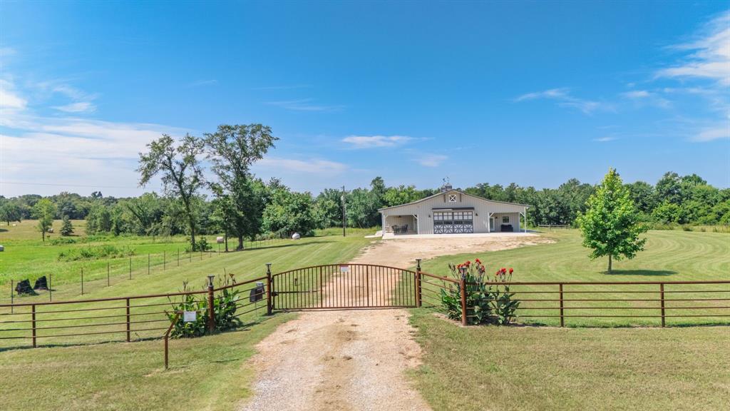 2072 East US 69 Emory, TX 75440 - Photo 36 of 39 a view of a yard with an outdoor space