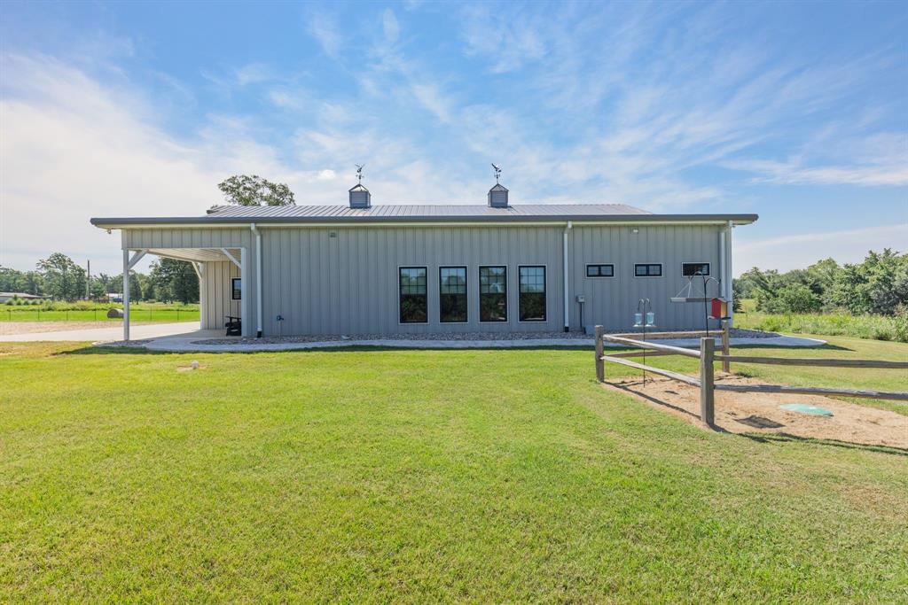 2072 East US 69 Emory, TX 75440 - Photo 4 of 39 a view of a house with a swimming pool