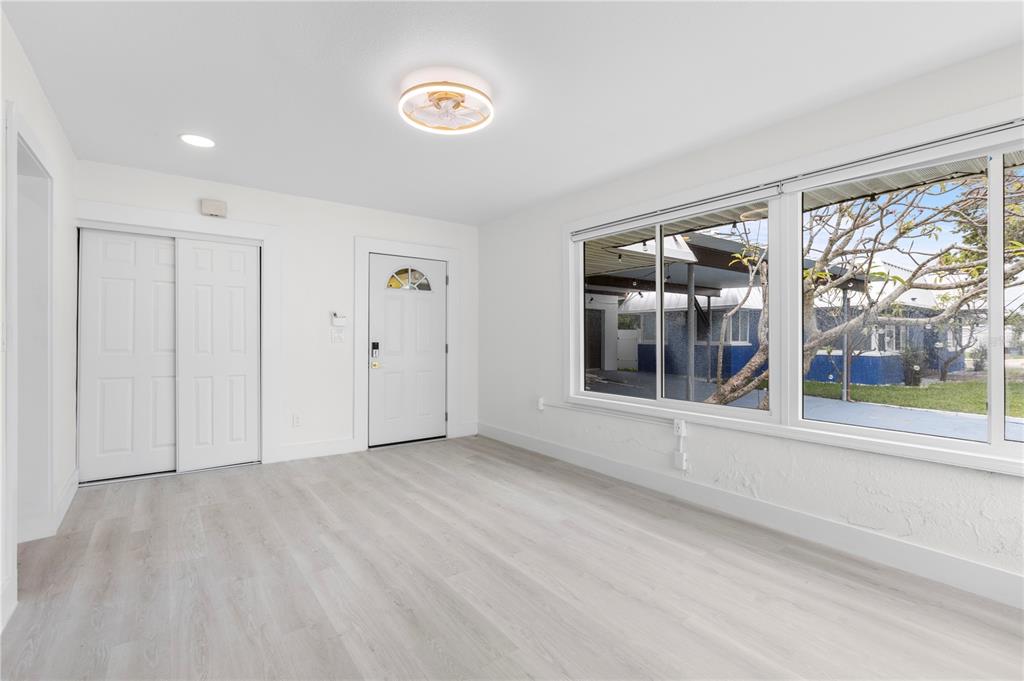 14060 Miramar Avenue, Unit 1 #2 #3 #4 Madeira Beach, FL 33708 - Photo 17 of 38 a view of an empty room with a window