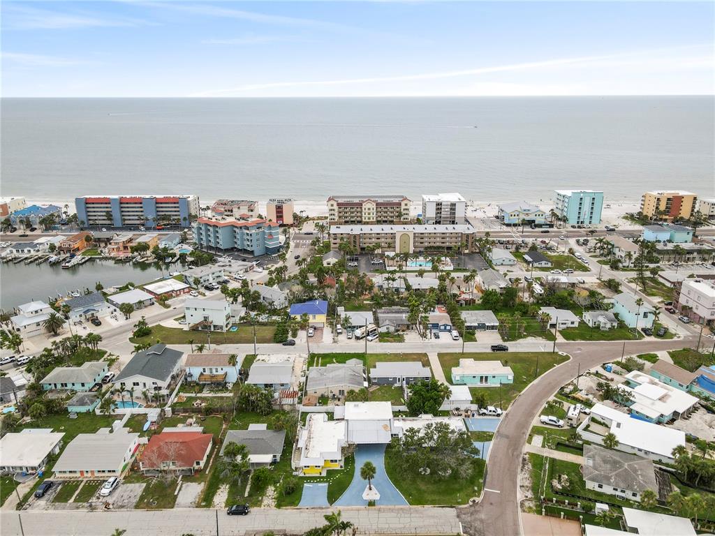 14060 Miramar Avenue, Unit 1 #2 #3 #4 Madeira Beach, FL 33708 - Photo 2 of 38 an aerial view of a city