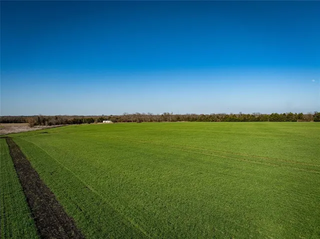 a view of yard with swimming pool and outdoor seating
