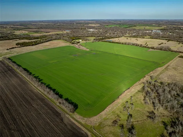 a view of a lake with a beach