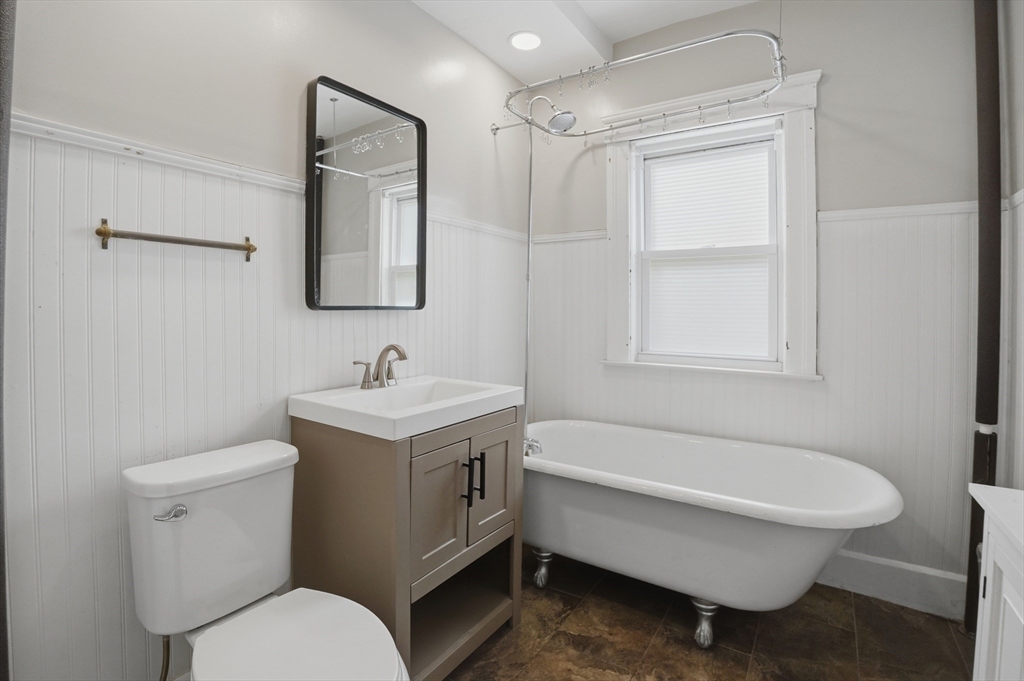 3 Boyden St Extension Webster, MA 01570 - Photo 16 of 34 a bathroom with a sink toilet and a mirror