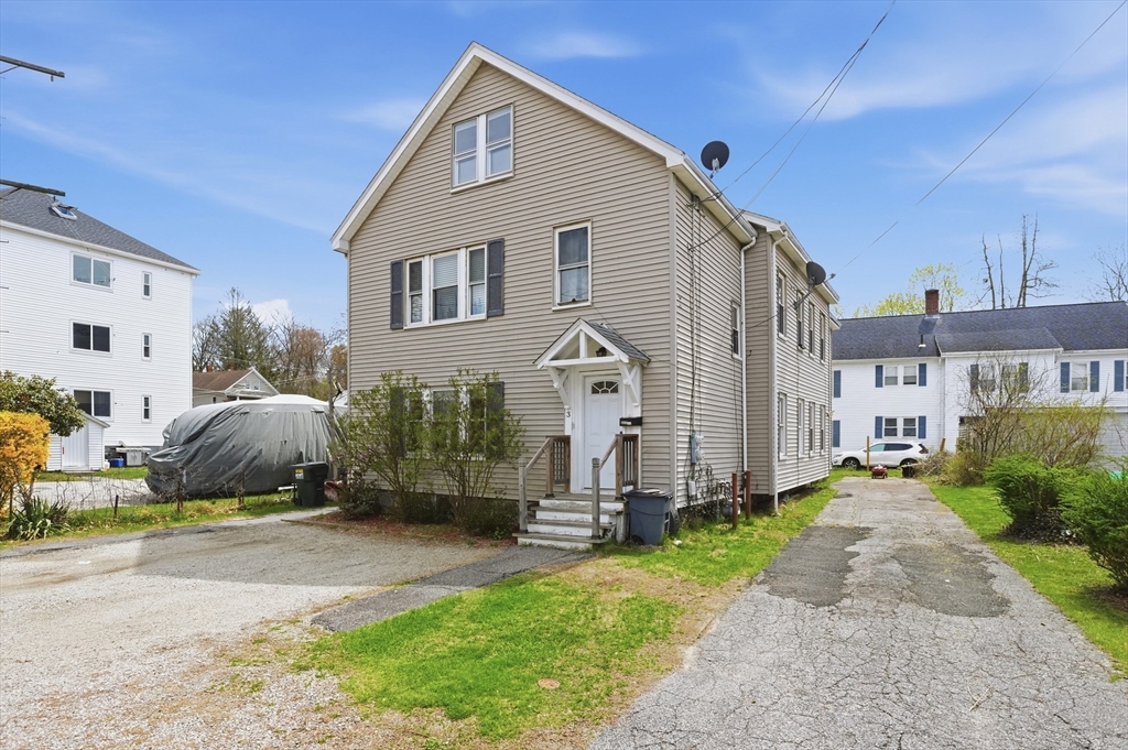 3 Boyden St Extension Webster, MA 01570 - Photo 2 of 34 a front view of a house with garden