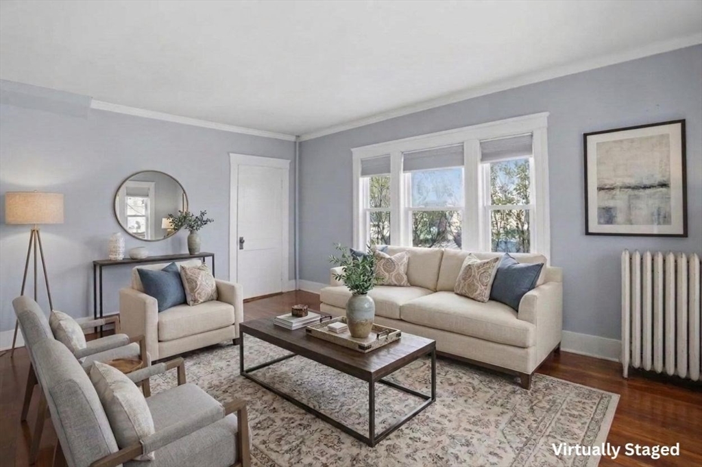 3 Boyden St Extension Webster, MA 01570 - Photo 5 of 34 a living room with furniture a large window and a table