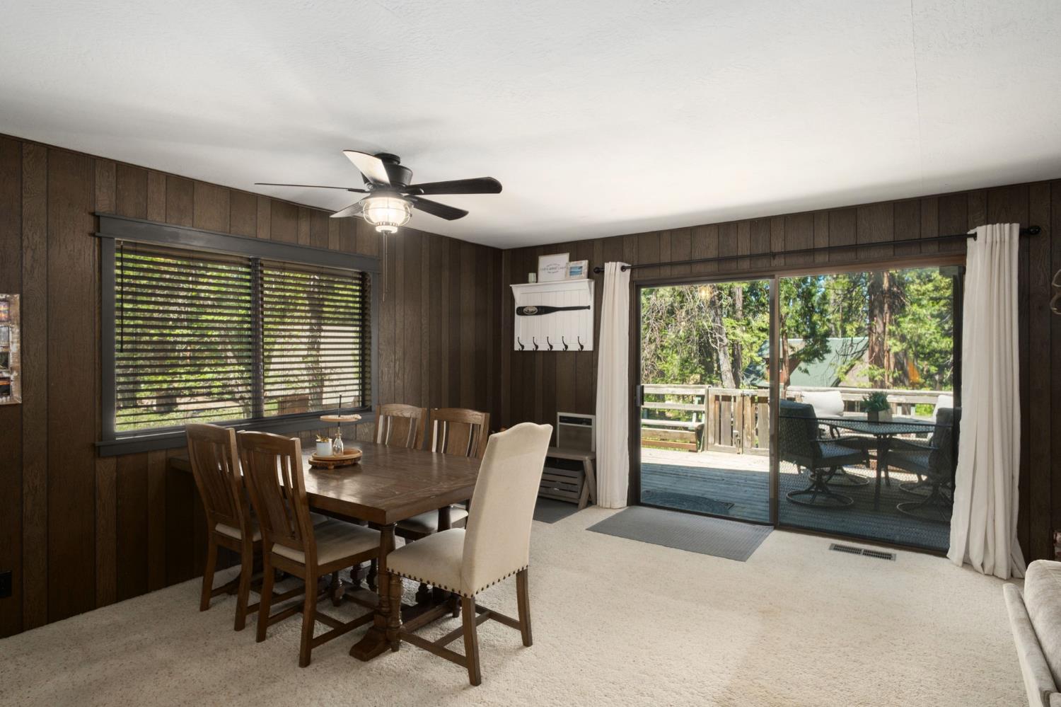 42488 Rock Ledge Road Shaver Lake, CA 93664 - Photo 14 of 26 a view of a dining room with furniture window and outside view
