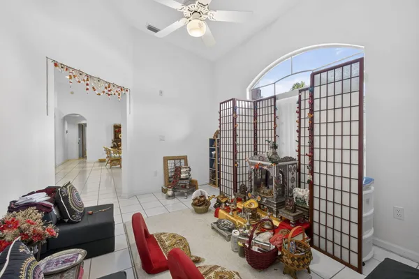 a kitchen that has a lot of cabinets in it and appliances