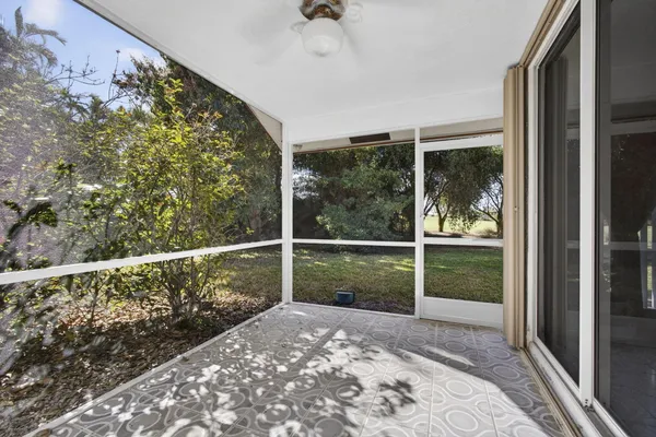 an aerial view of residential houses with outdoor space and river